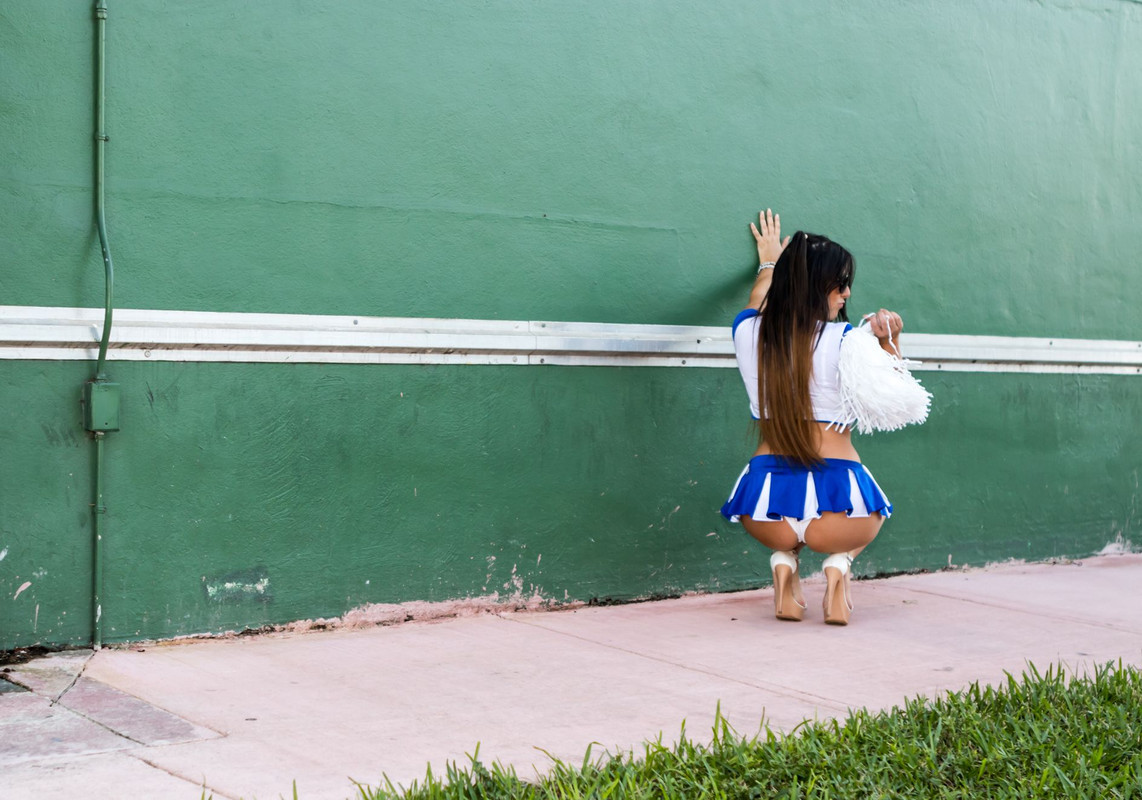 Claudia Romani upskirt – cheerleader halloween outfit | UpskirtSTARS